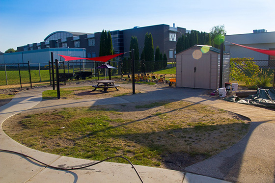 Before SYNLawn image of ymca play area before synthetic grass