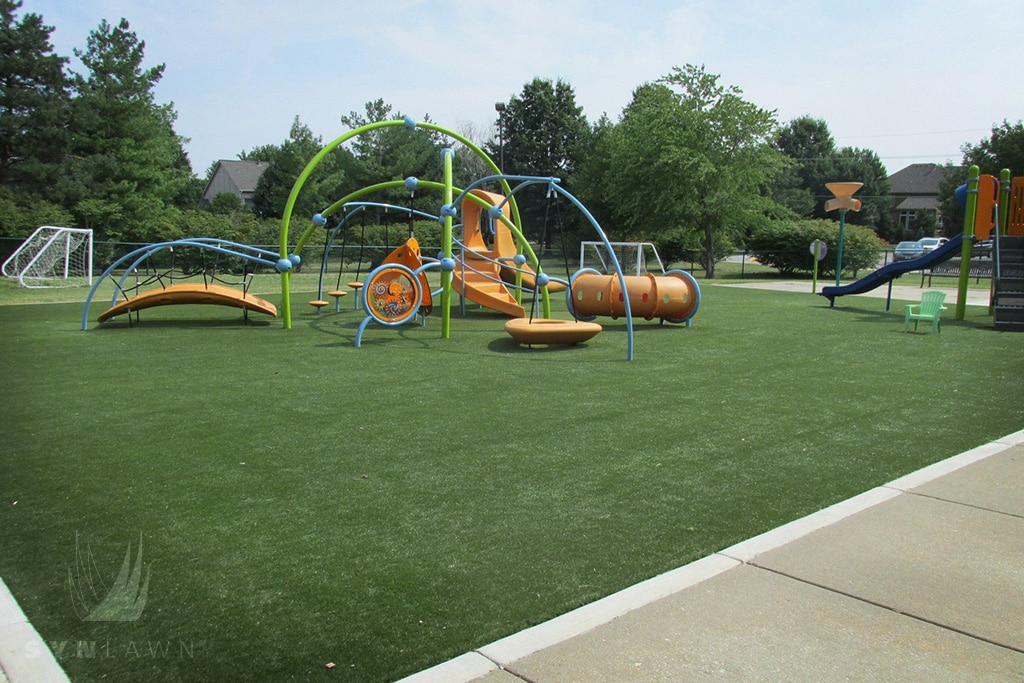 image of leawood kansas playground with artificial grass