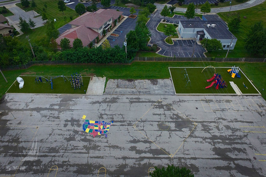 aerial image of lee’s summit mo playground with artificial grass playground surface