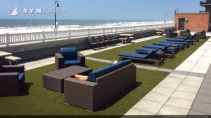SYNLawn artificial grass commercial hotel resort sun bathing by the ocean