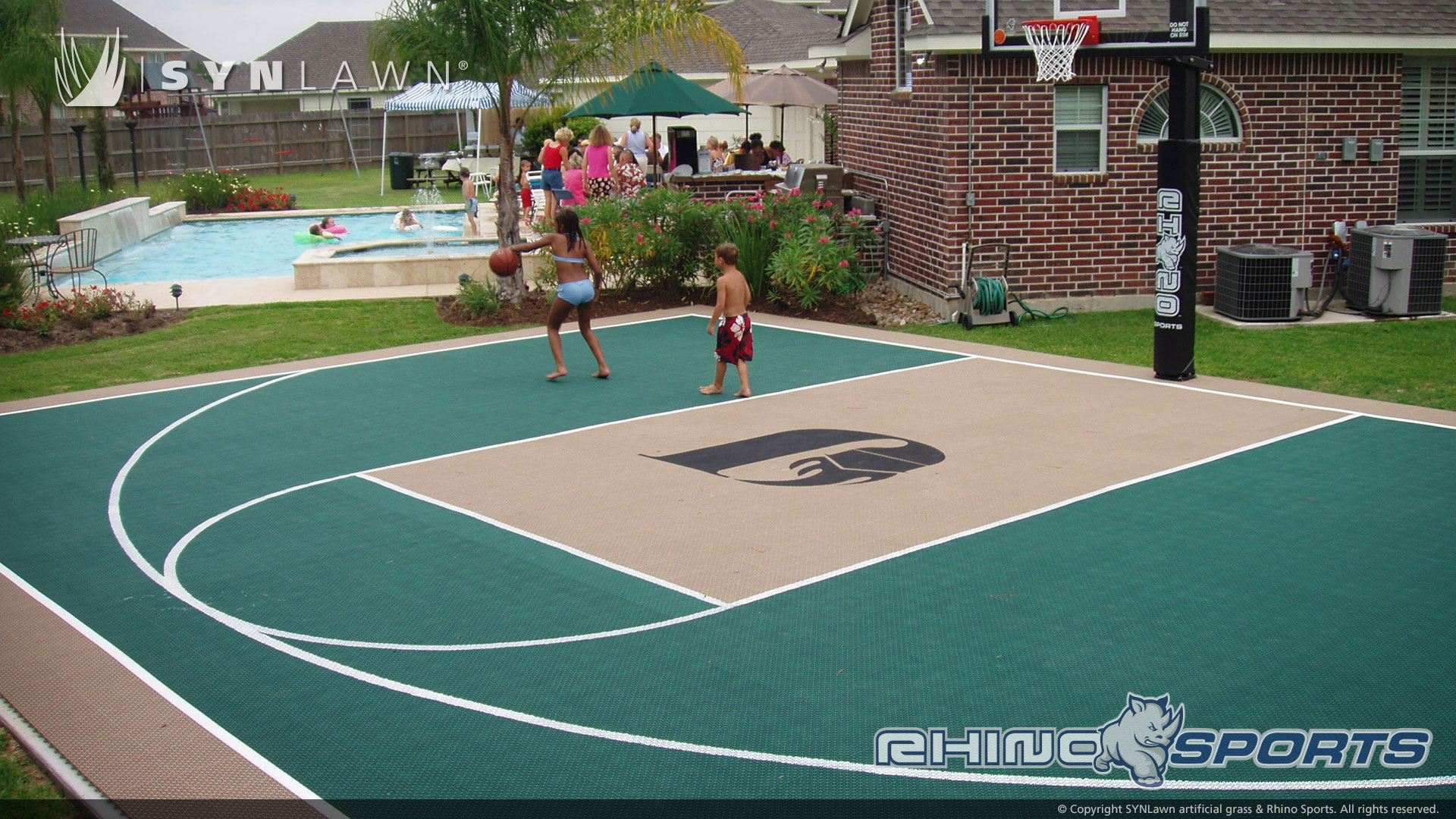 image of kids playing basketball on backyard home bball court