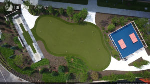 image of SYNLawn artificial grass custom putting green horseshoe pit and outdoor ping-pong area at Mathworks in Natick, MA