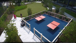 image of SYNLawn artificial grass custom putting green horseshoe pit and outdoor ping-pong area at Mathworks in Natick, MA