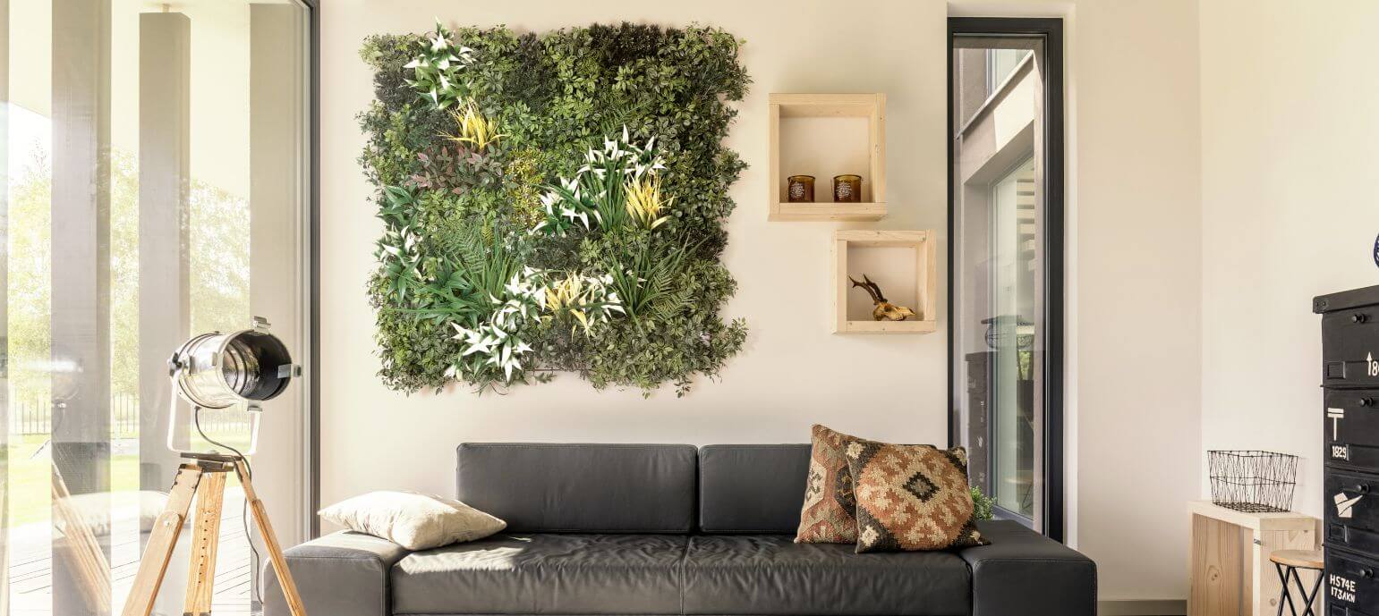 CalicoGreens_Wall_1 Interior of home with tan walls and an artificial green wall panel