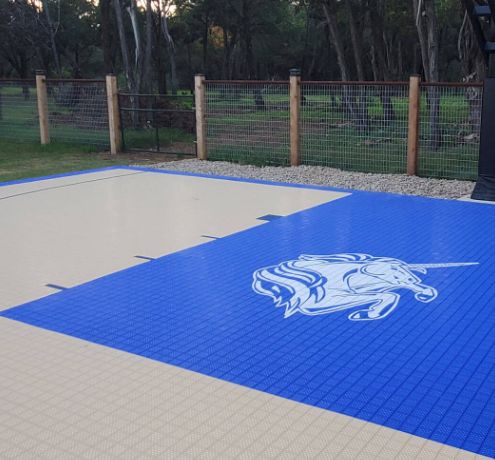 Blue and grey SYNCourt with a logo printed in white