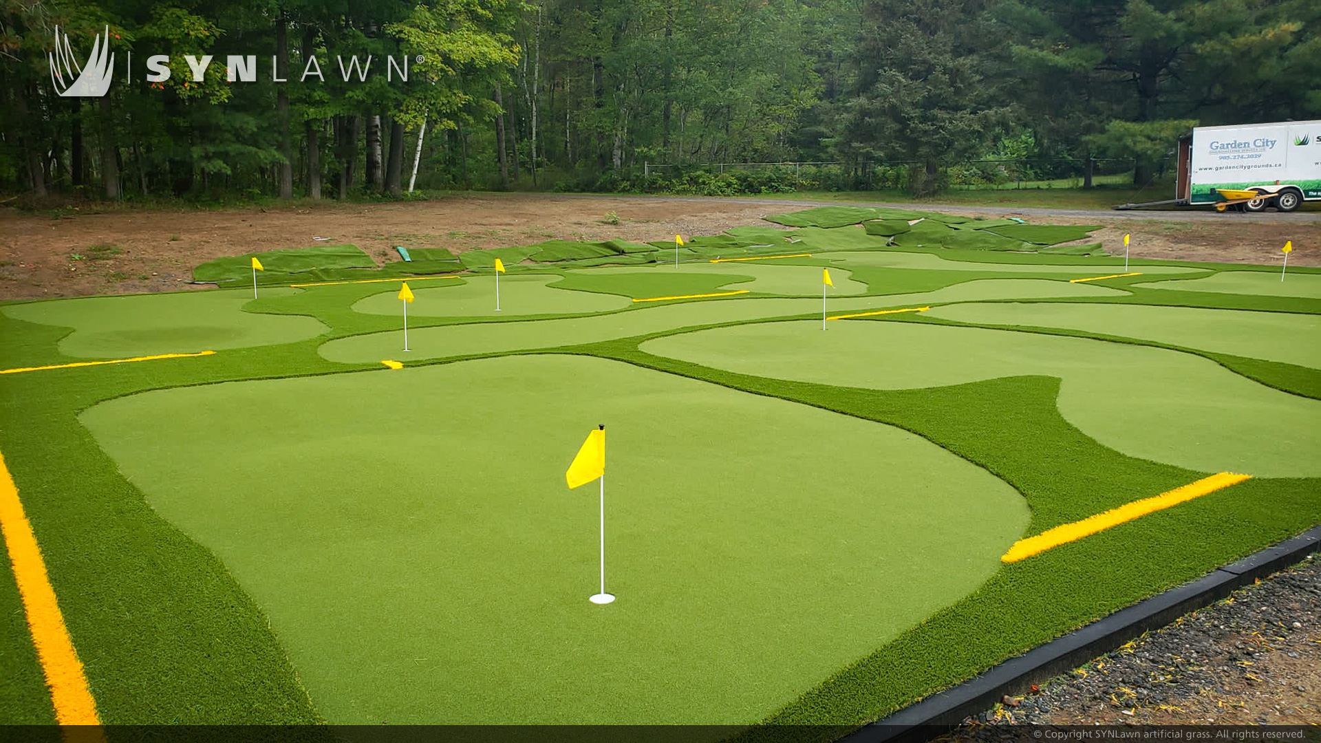 image of SYNLawn Toronto installs artificial grass Soccer field and 8 hold Mini Golf Course at Canadian National Institute for the Blind